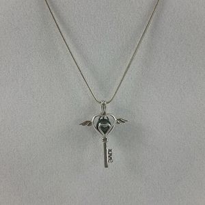 Sterling Silver Heart With Wings Cage Necklace